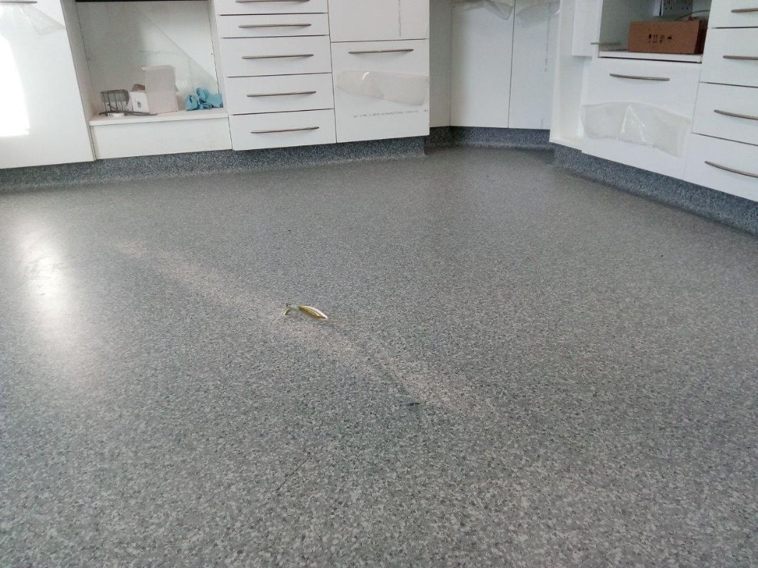 Commercial vinyl floor Shaun fitted in a Stroud kitchen, seams welded flat